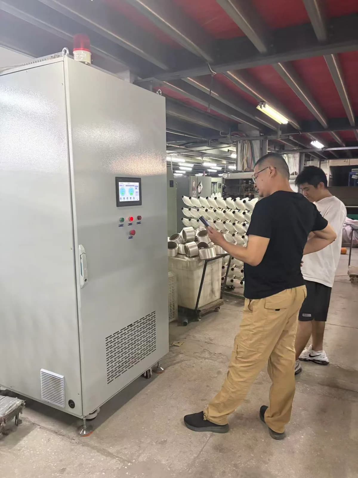 Wilson Technology WS-300 installed in a textile twisting workshop in Hangzhou, Zhejiang, protecting 16 two-for-one twisting machines.