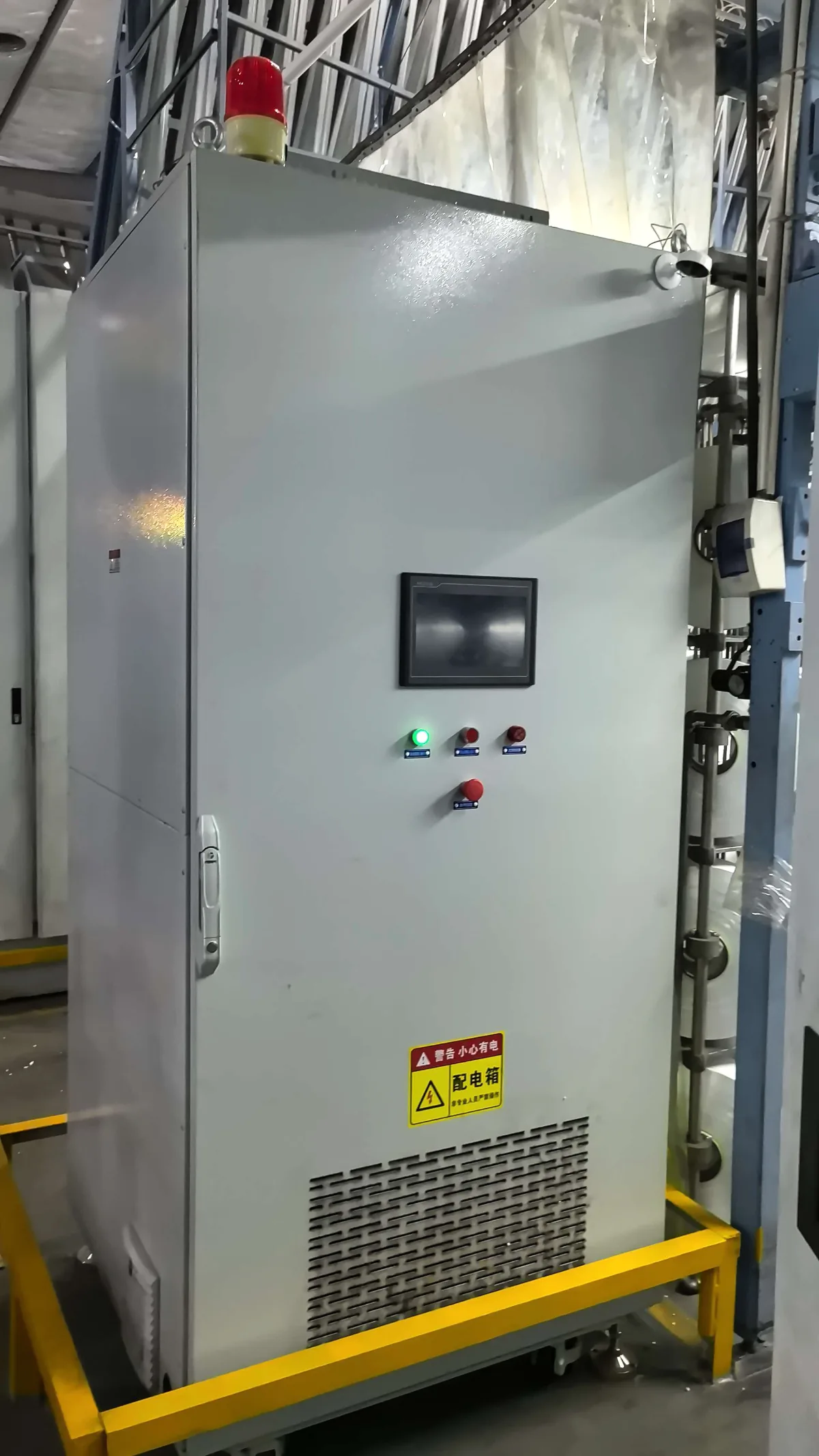 Close-up of a Wilson power-continuity cabinet installed in a textile manufacturing workshop in Fujian, China.